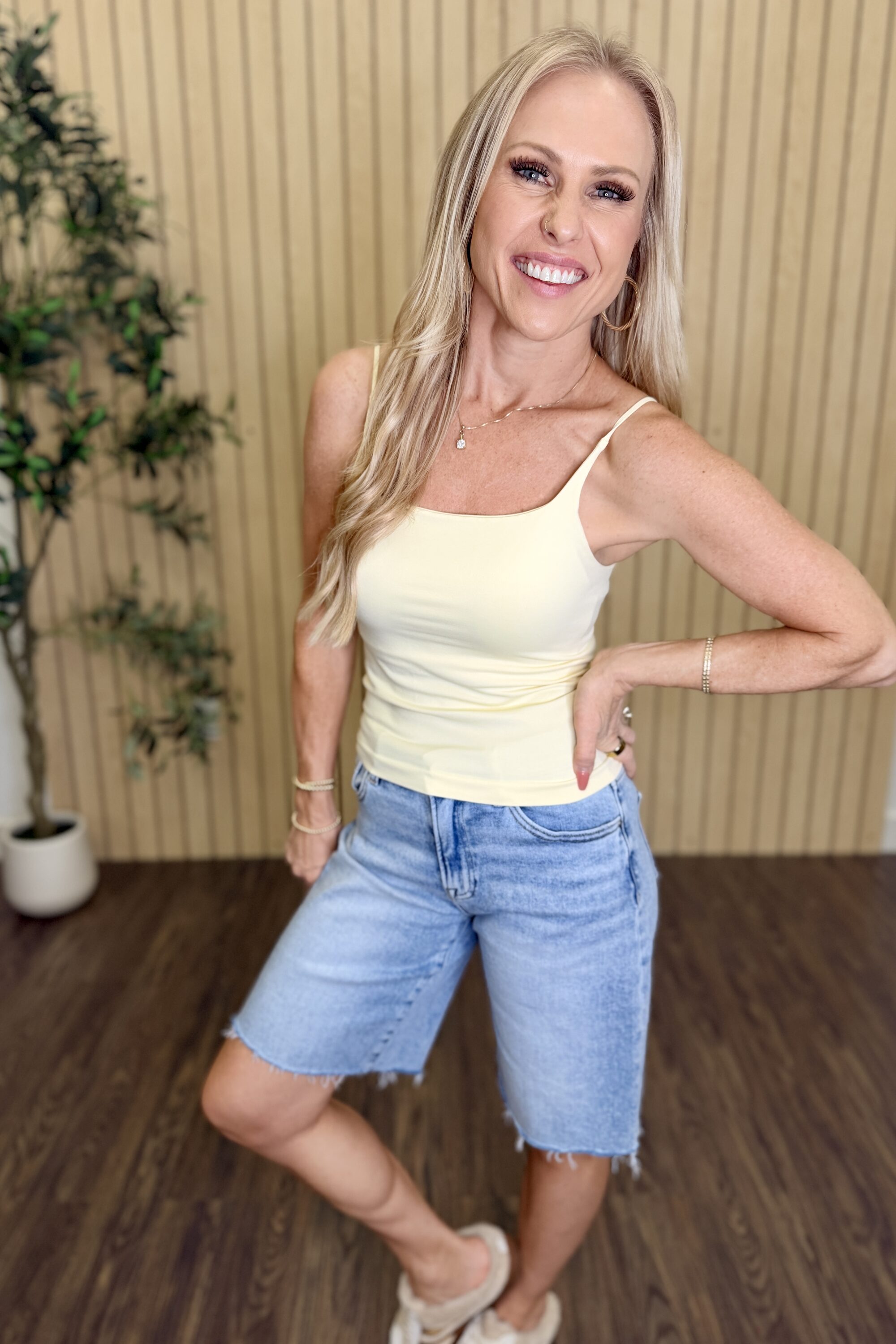 Melanie Clean Line Square Cami in Pale Banana with Bermuda shorts, hand on hip