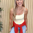 Melanie Clean Line Square Cami in Pale Banana with a red sweater tied at the waist