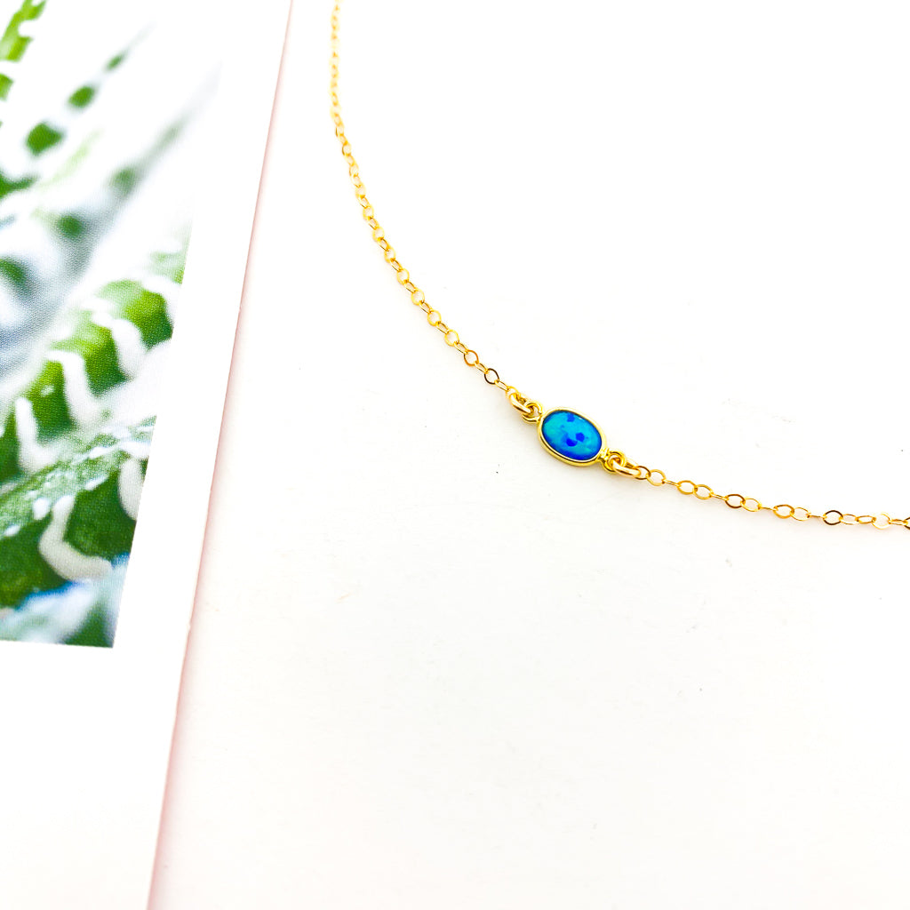 OVAL HELD BLUE LAB OPAL NECKLACE | 14K GOLD-FILLED - MTT Collective
