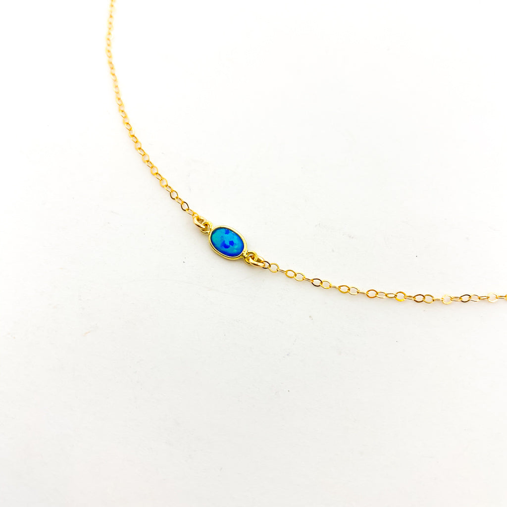 OVAL HELD BLUE LAB OPAL NECKLACE | 14K GOLD-FILLED - MTT Collective