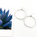 LARGE TWISTED HAMMERED HOOP EARRINGS | RHODIUM PLATED - MTT Collective